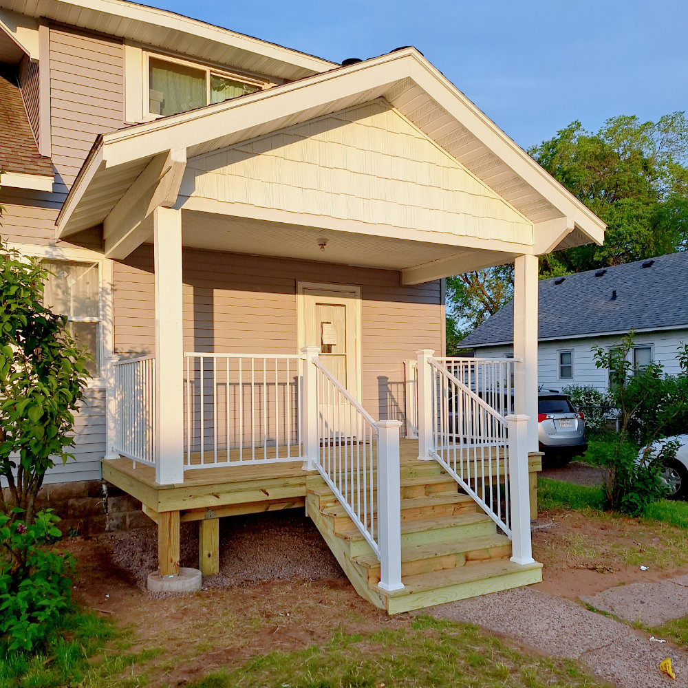 New front porch build and siding installation in Eau Claire Wisconsin